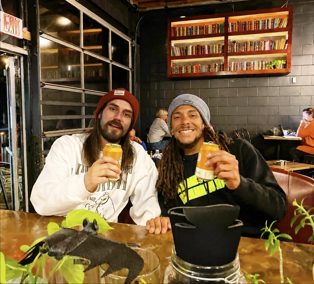 Friends sharing drinks inside STIR